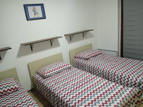 Postel nebo postele na pokoji v ubytování Apartman MARA