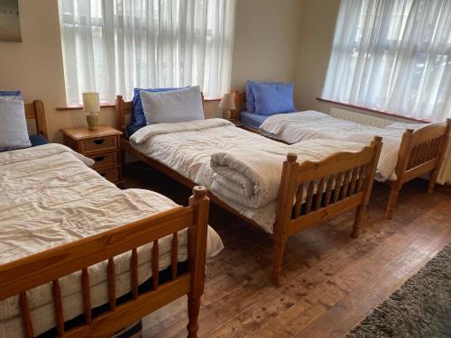Postel nebo postele na pokoji v ubytování Mount Brandon Hostel