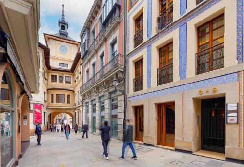 a group of people walking down a street at Casco Histórico-Catedral in Oviedo