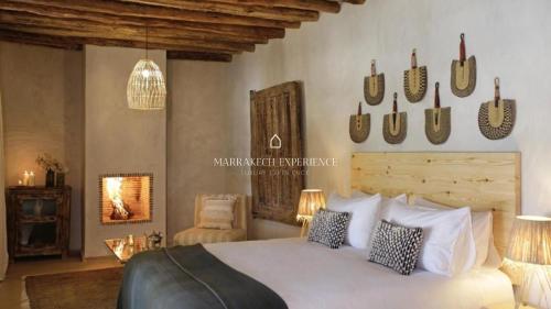 Postel nebo postele na pokoji v ubytování Jardin Bleu