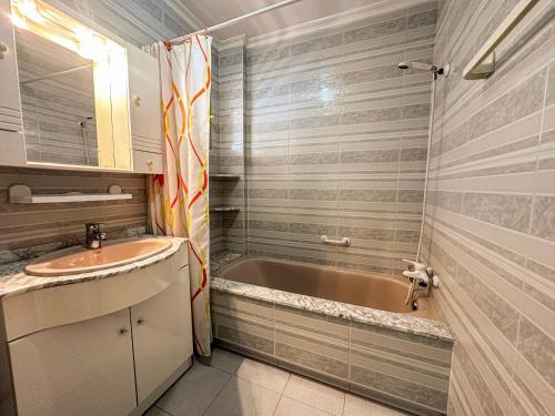 a bathroom with a sink and a bath tub at La Mata dream in La Mata