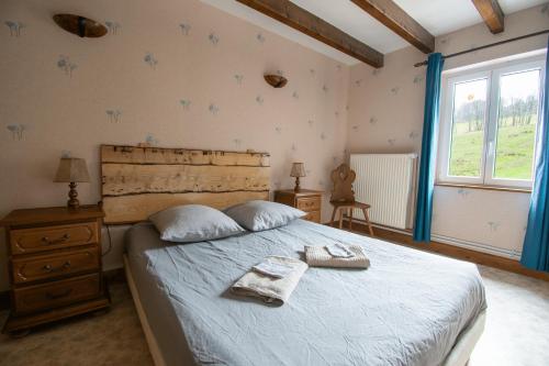 Postel nebo postele na pokoji v ubytování La ferme au gîte. (accepte les animaux)