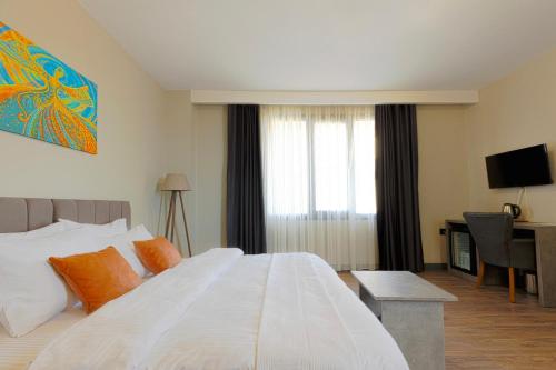 Postel nebo postele na pokoji v ubytování Grand royal hotel