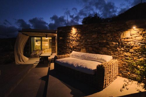 Ένα ή περισσότερα κρεβάτια σε δωμάτιο στο Hidden Retreats Kythera