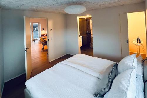 Postel nebo postele na pokoji v ubytování Lejlighed, 3 km fra Thorshavn centrum, Færøerne
