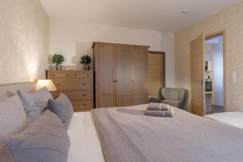 Ένα ή περισσότερα κρεβάτια σε δωμάτιο στο Monopol Apartments