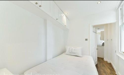 Postelja oz. postelje v sobi nastanitve Covent Garden 2 Bed Apartment