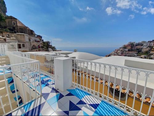 a balcony with a view of the ocean at La Pigolina Blue in Positano