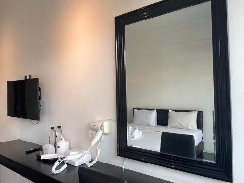 Katil atau katil-katil dalam bilik di Azz Hotel