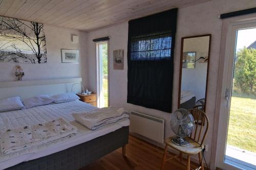 Postel nebo postele na pokoji v ubytování Fantastiskt hus på fårö