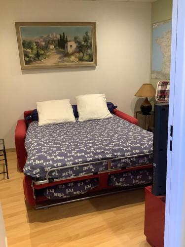 Ένα ή περισσότερα κρεβάτια σε δωμάτιο στο Apartloisir
