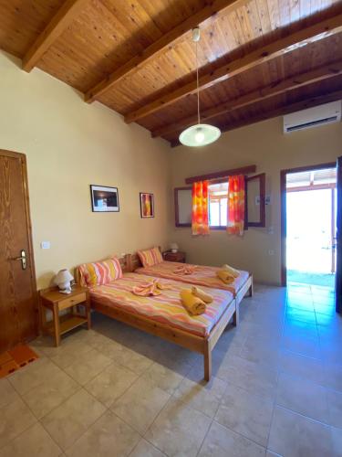 a bedroom with a large bed in a room at Gavdos Panorama in Gavdos
