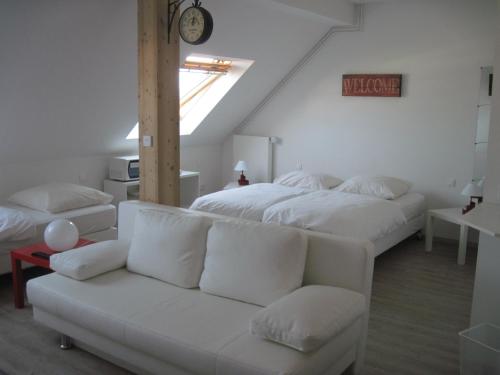 Postel nebo postele na pokoji v ubytování Hôtel Des Bois