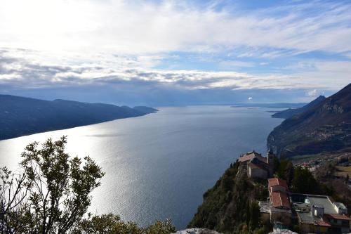 a view of a large body of water on a hill at Apartment Cristina - Tignale Lake Garda in Tignale