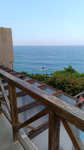a view of the ocean from the balcony of a resort at Hotel Casa Barlovento, Parque Tayrona in Los Naranjos
