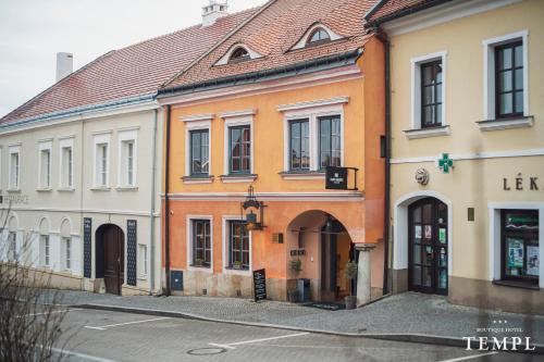 a group of buildings on a street at Boutique Hotel Templ in Mikulov