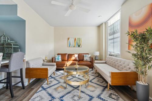 a living room with a couch and a table at THE CARRICK in Bisbee
