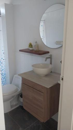 a bathroom with a sink and a toilet at Finca Villa Maria in La Pintada