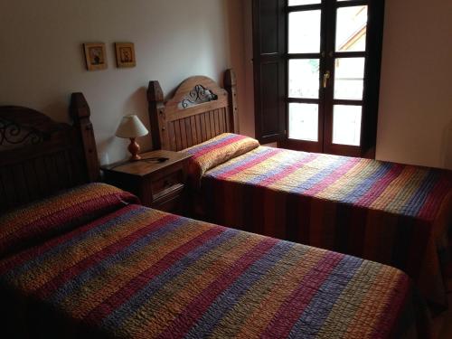 Postel nebo postele na pokoji v ubytování Apartaments Pirinenc
