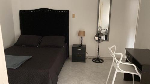 Кровать или кровати в номере Casa MoraZ Negro