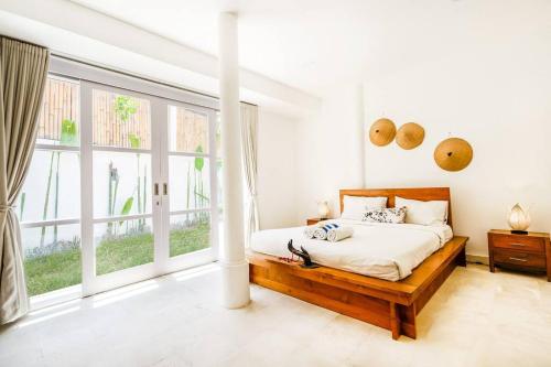 Säng eller sängar i ett rum på Spacious tropical 3BR pool villa