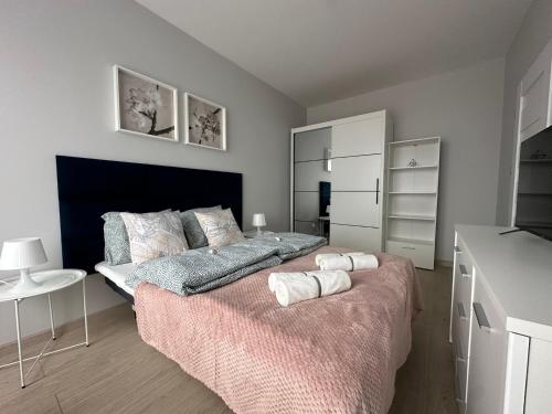 Ένα ή περισσότερα κρεβάτια σε δωμάτιο στο Premium Apartment - Orchidea