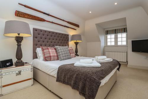 Säng eller sängar i ett rum på Hartlands, Aldeburgh