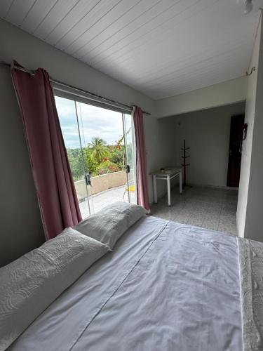 Postel nebo postele na pokoji v ubytování Sítio Encanto do Delta