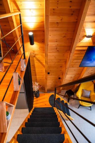 TV a/nebo společenská místnost v ubytování KOVU chalet