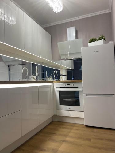 A cozinha ou cozinha compacta de Apartament Szarotki