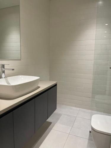 Koupelna v ubytování 1 BR Luxury Apt by AJ Aljada