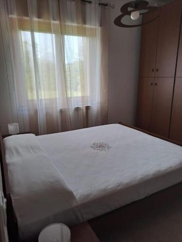 Postel nebo postele na pokoji v ubytování Appartamento Rossana - Luni (SP)