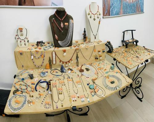 a display ofjeweled items on a table in a store at Le Lodge des Almadies in Dakar