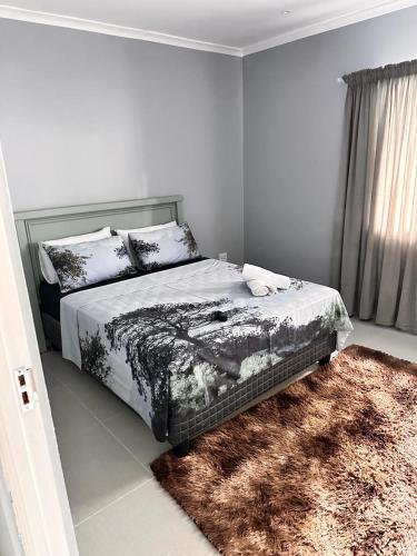 Postel nebo postele na pokoji v ubytování Malaika Guest House