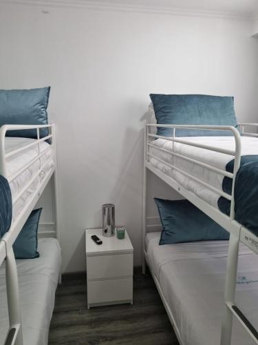 Una cama o camas en una habitación de Mikaela Guest House