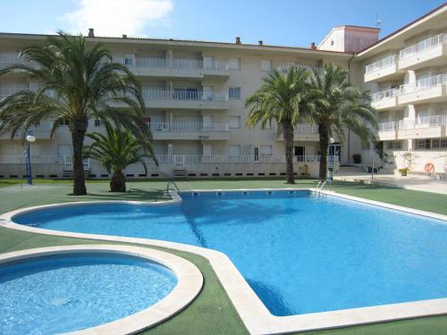 Appartement familial à L'Estartit avec piscine, près de la plage