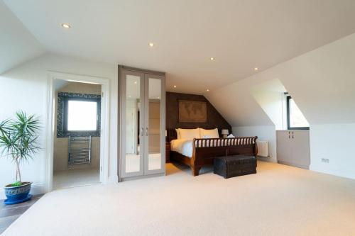 a bedroom with a bed in a attic at Blasket View - 5 Star in Dingle