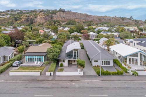 an aerial view of a residential neighborhood with houses at Beachside Bliss - Redcliffs in Christchurch