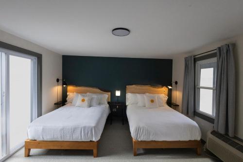 Ένα ή περισσότερα κρεβάτια σε δωμάτιο στο East Rock Inn