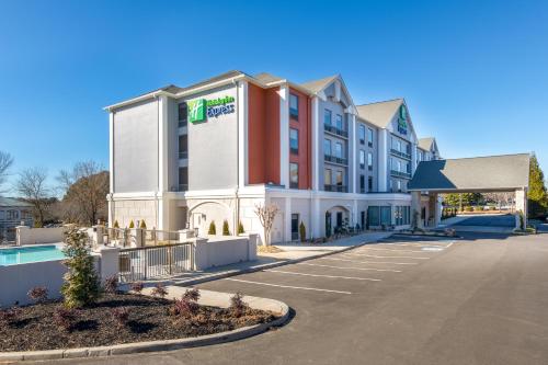 a rendering of a hotel with a parking lot at Holiday Inn Express Atlanta West - Theme Park Area by IHG in Lithia Springs