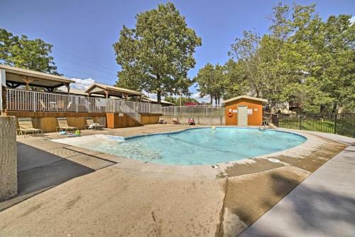 a swimming pool in a yard with a house at Free Silver Dollar City Tickets & other attractions! Branson, Walk-In Available in Reeds Spring