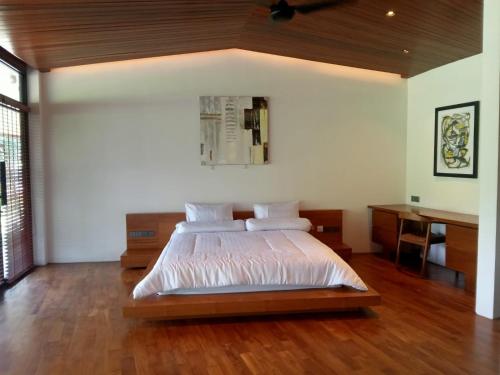 Ένα ή περισσότερα κρεβάτια σε δωμάτιο στο Beautiful Round Villa in Payangan
