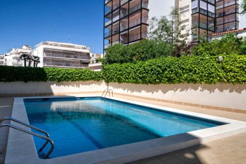 Bazén v ubytování The Rose by Hello Homes Sitges nebo v jeho okolí