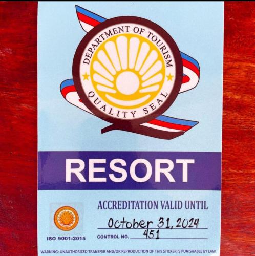 a permit for a restart of a vehicle with a logo at Lotus Sun & Waves Beach Resort in Baler