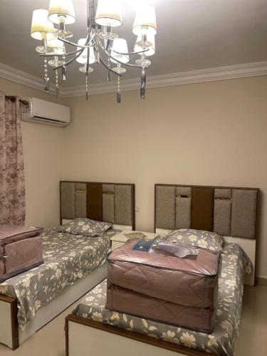 Ένα ή περισσότερα κρεβάτια σε δωμάτιο στο مدينة نصر