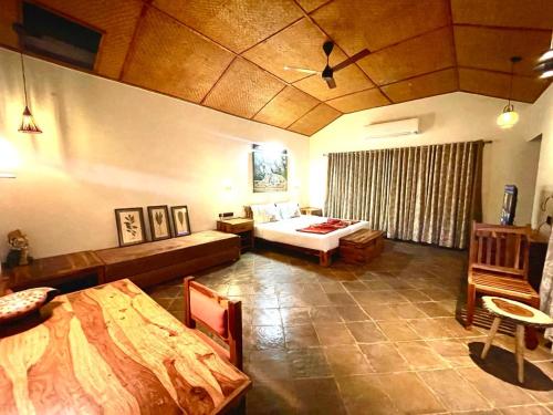 Cama o camas de una habitación en Tathastu Bandhavgarh