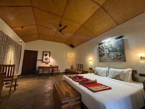 Cama o camas de una habitación en Tathastu Bandhavgarh