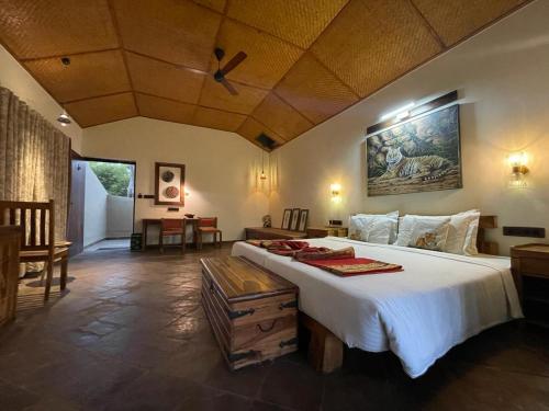 Cama o camas de una habitación en Tathastu Bandhavgarh