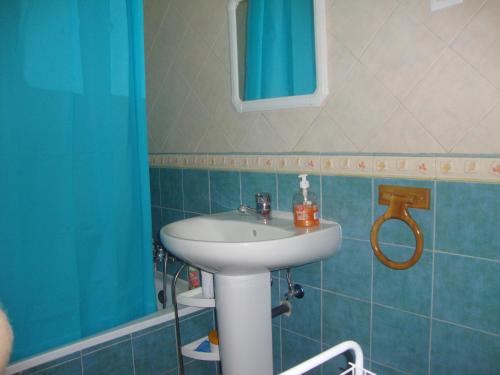 a bathroom with a sink and a mirror at La Nature alojamiento natural in La Codosera