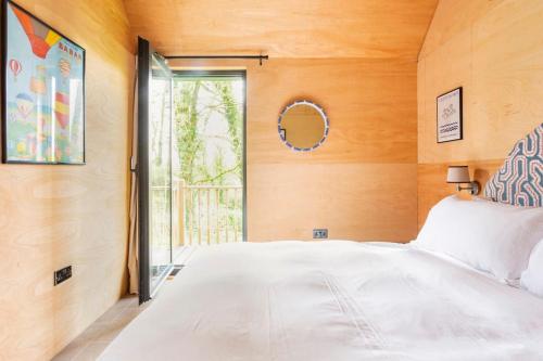 Ένα ή περισσότερα κρεβάτια σε δωμάτιο στο Cabin with a spectacular outlook